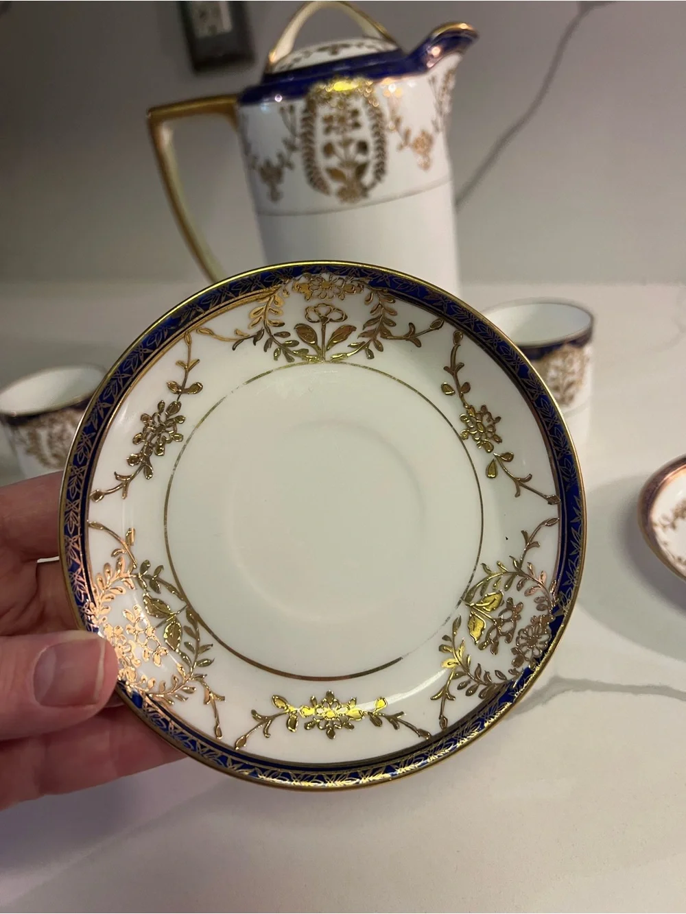 Elegant White Porcelain Coffee/Tea Set with Dark Blue and Gold Trim